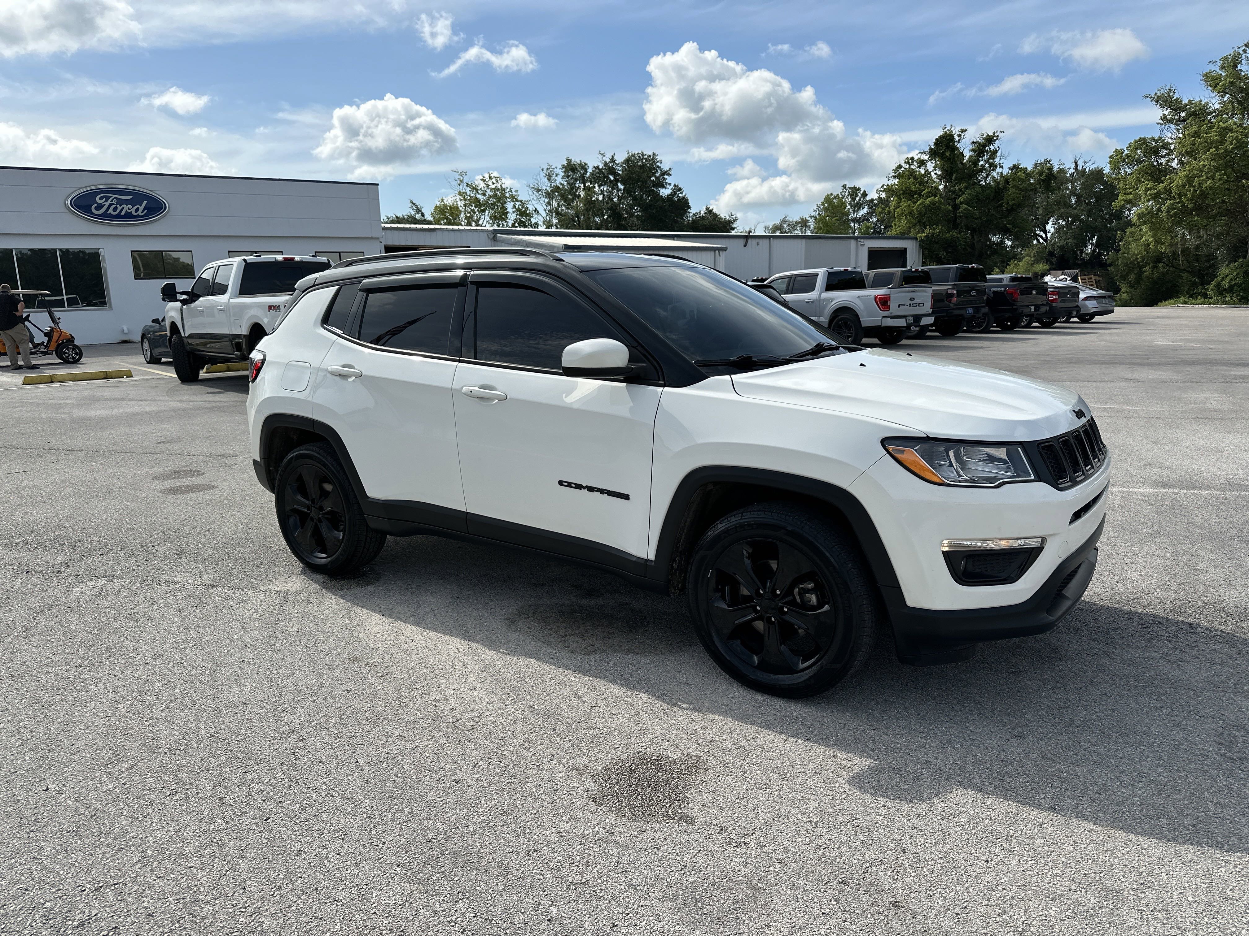 Used 2021 Jeep Compass Altitude with VIN 3C4NJDBB0MT567942 for sale in Dade City, FL