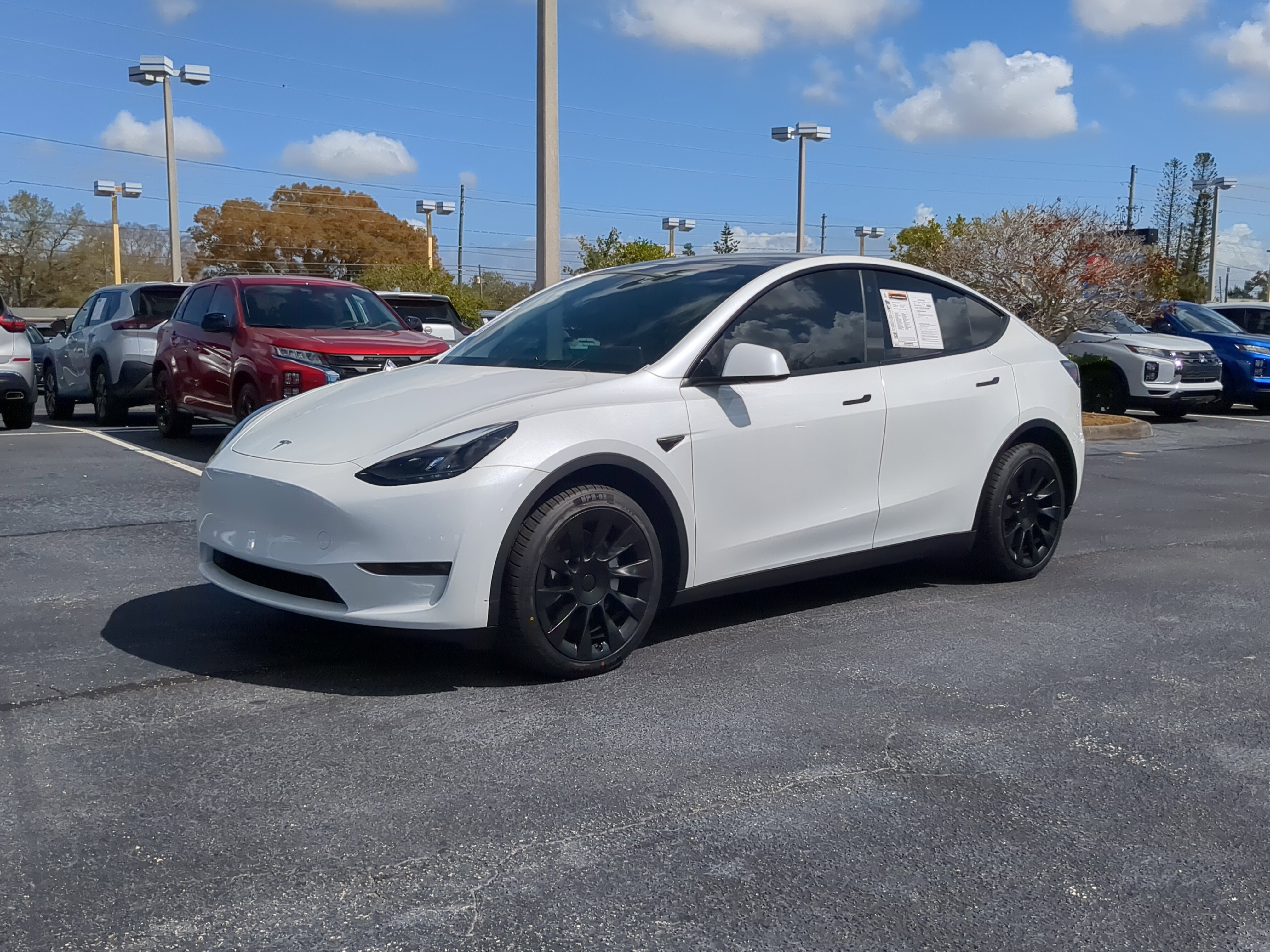Used 2023 Tesla Model Y Long Range with VIN 7SAYGDEEXPF676478 for sale in Seminole, FL