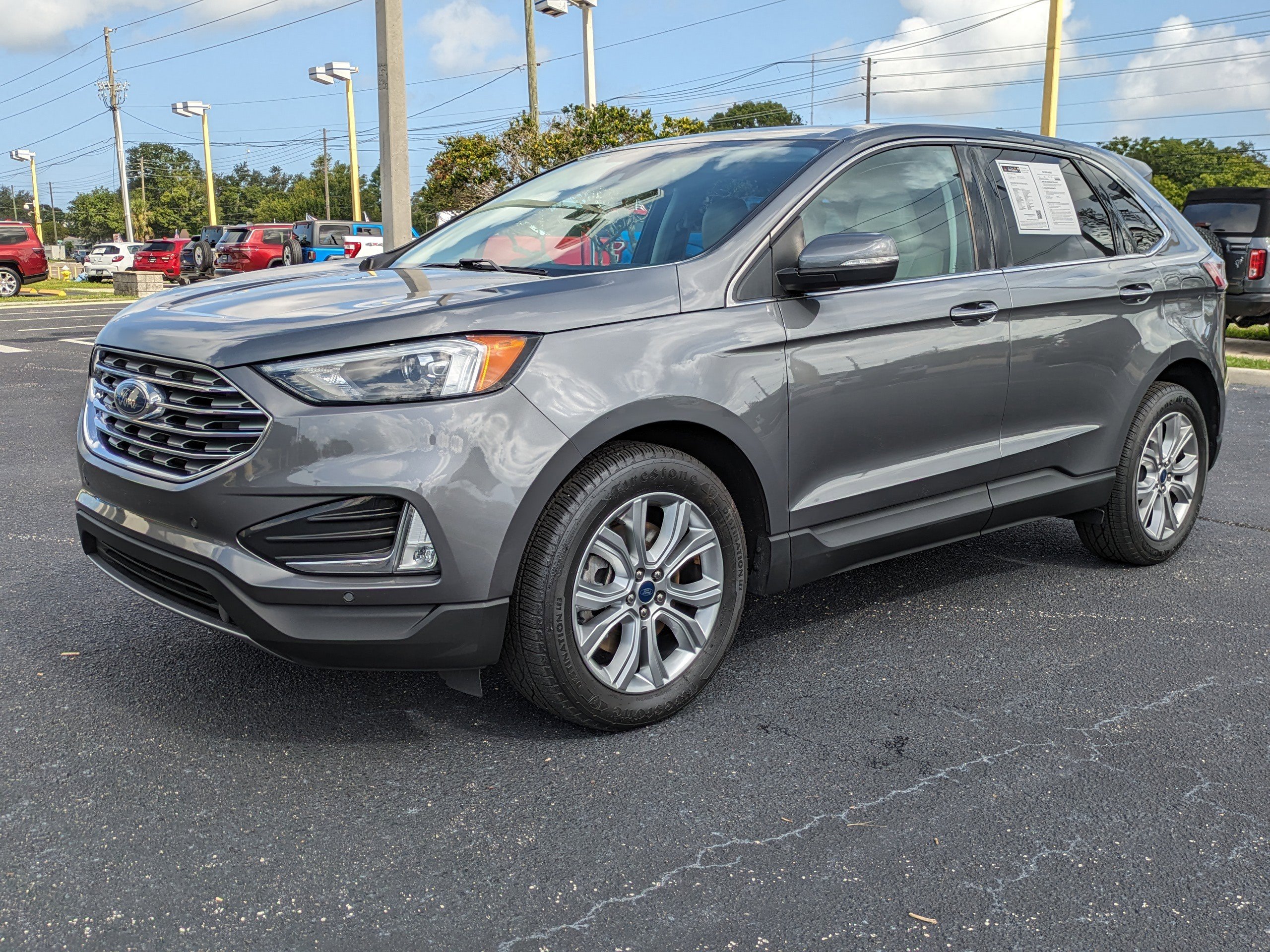 Used 2022 Ford Edge Titanium with VIN 2FMPK4K95NBA53323 for sale in Seminole, FL