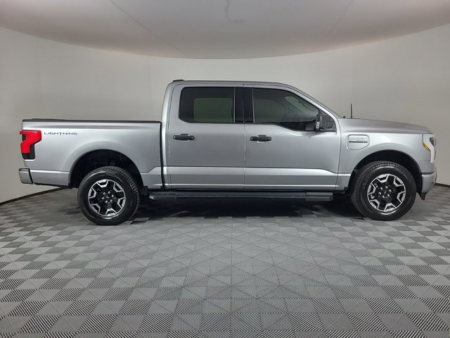 Used 2023 Ford F-150 Lightning XLT with VIN 1FTVW1EL1PWG06296 for sale in Brighton, CO