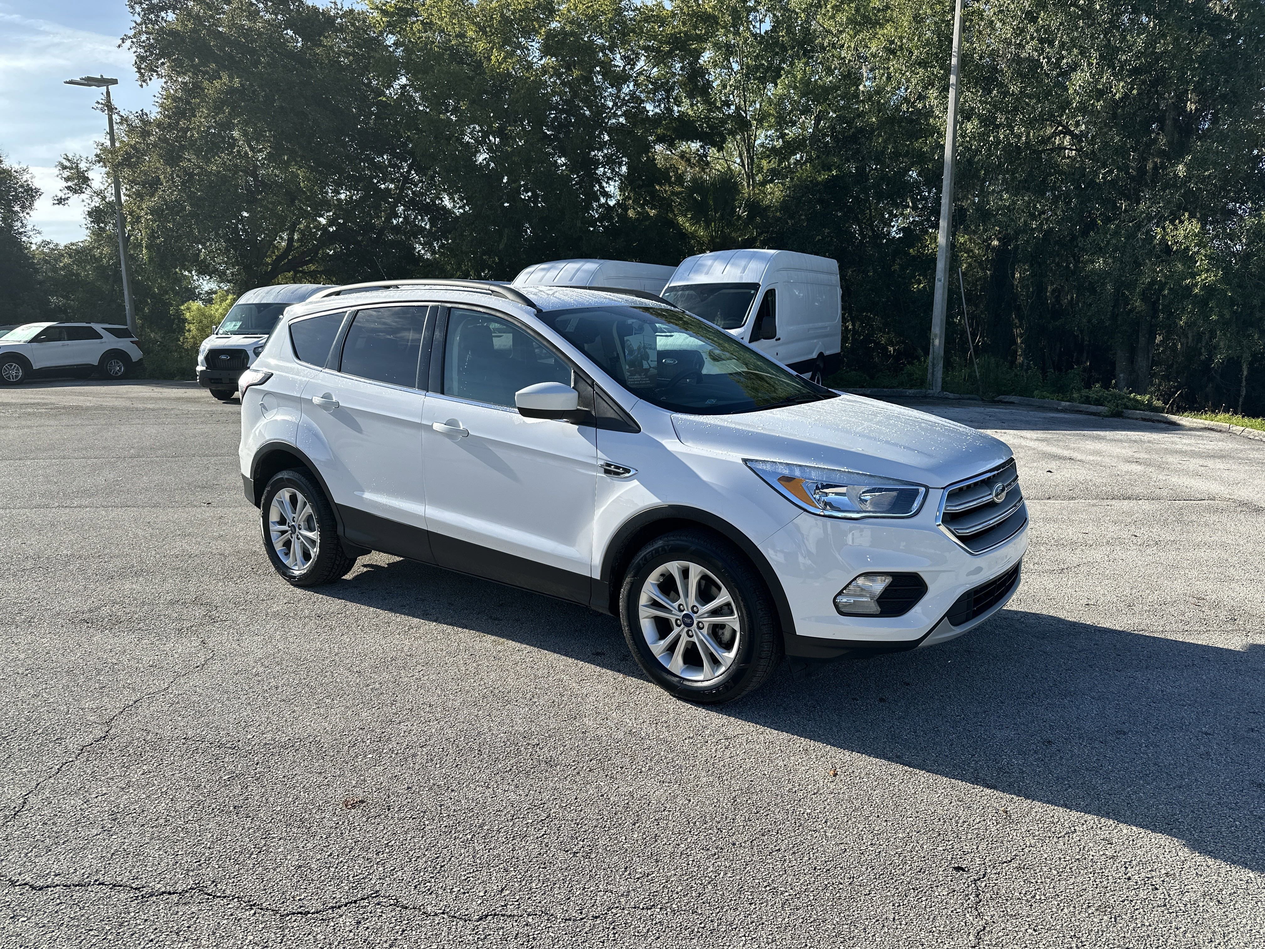 Used 2018 Ford Escape SE with VIN 1FMCU0GD8JUD00756 for sale in Dade City, FL