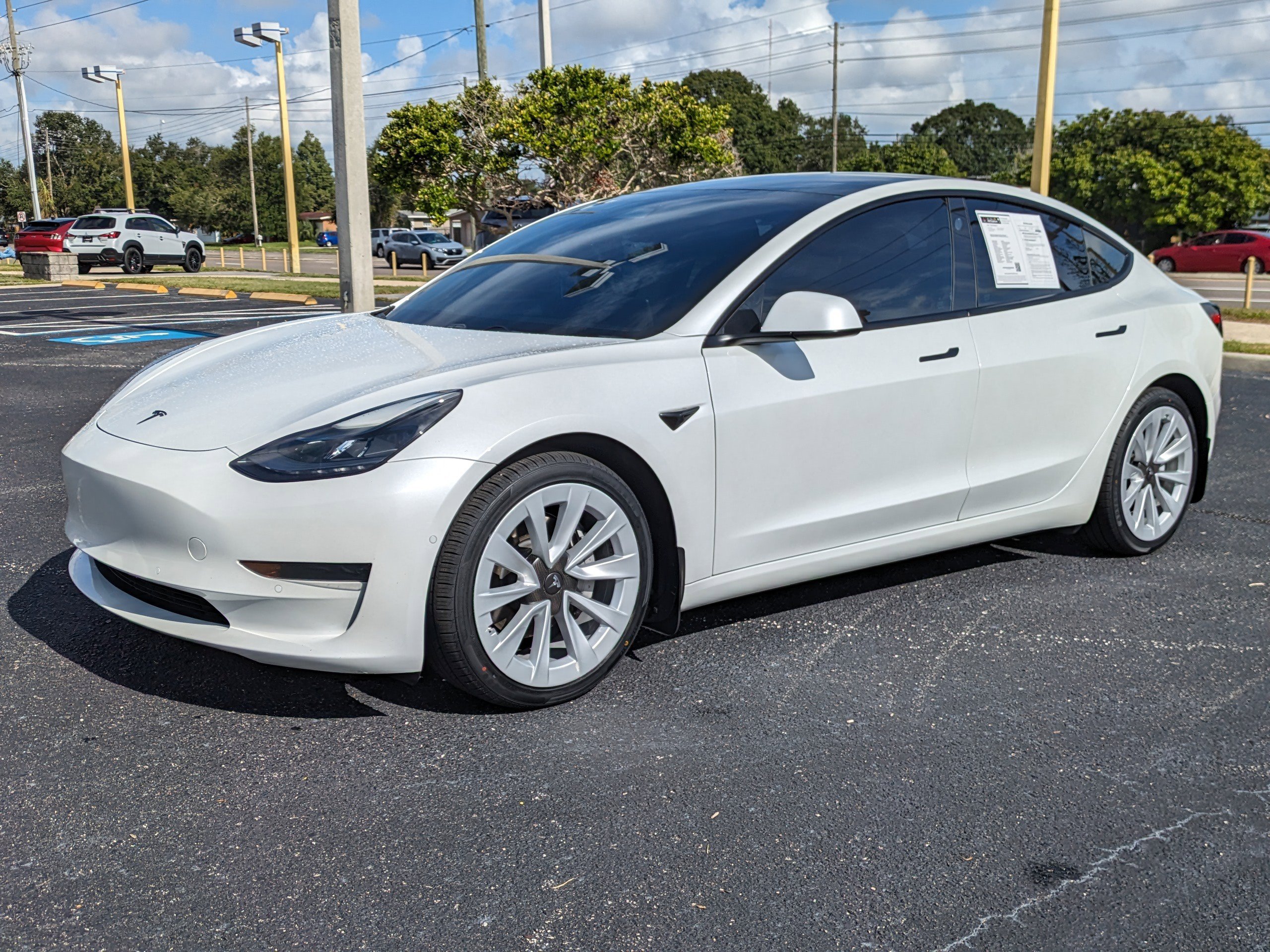 Used 2021 Tesla Model 3 Base with VIN 5YJ3E1EA0MF054301 for sale in Seminole, FL
