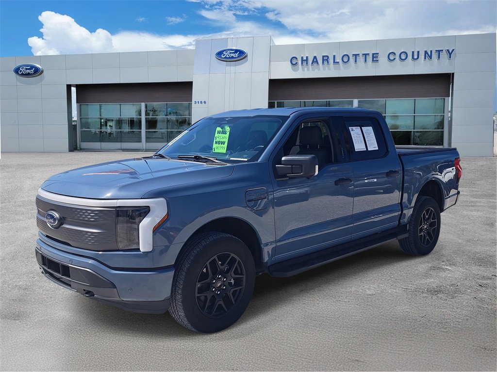 Used 2023 Ford F-150 Lightning XLT with VIN 1FTVW1EL0PWG38978 for sale in Port Charlotte, FL