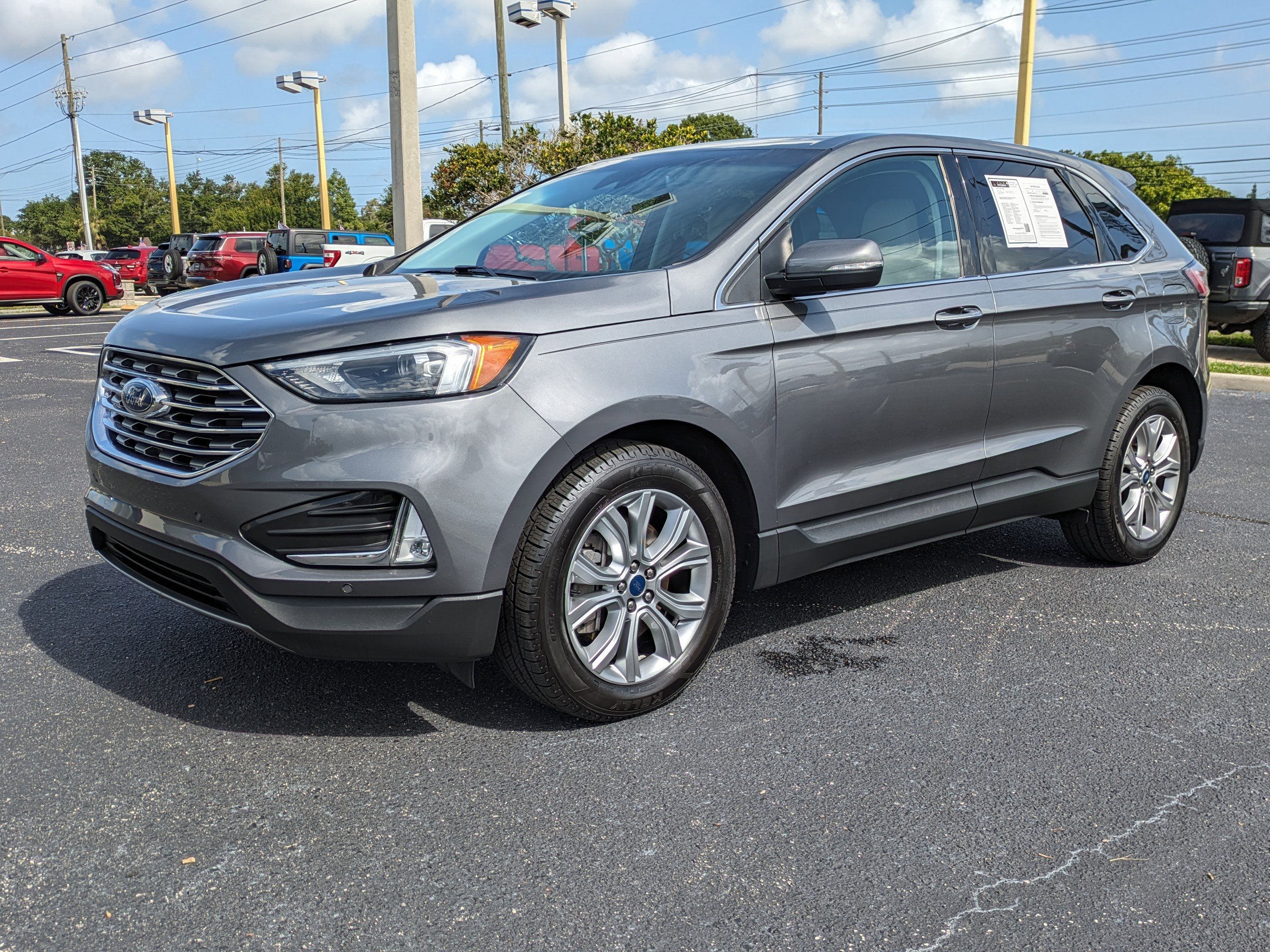 Used 2022 Ford Edge Titanium with VIN 2FMPK4K97NBB06555 for sale in Seminole, FL